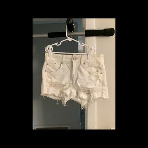 Cream shorts with lace pockets